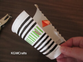 step 3 staple the paper to the cup