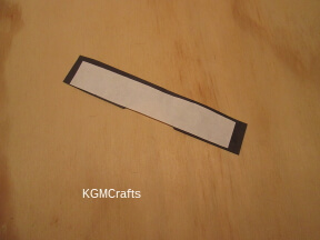 step 3 glue the white paper to the black