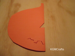paper jack step 1 fold paper and cut out nose and mouth