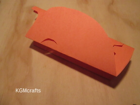 step 2 fold the sides and cut the eyes
