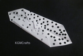 step 3 done with hole punch can use a standard hole punch