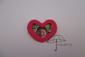 step 4 glue picture to heart