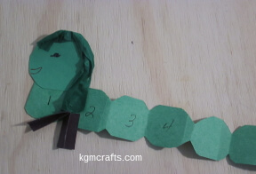 step 7 add numbers, legs, and head to your worm