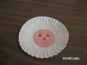 add the brown circle to the cupcake liner