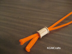 add the pipe cleaners to the spool