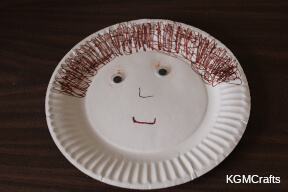 step 6 glue the eyes to the plate