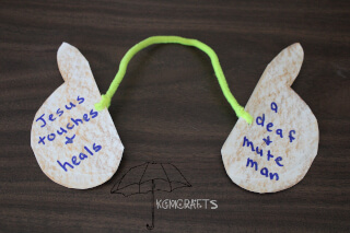 touch of Jesus heals a deaf man