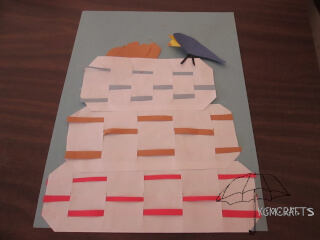3 baskets on top of each other with a bird eating bread from the top basket dream of the baker