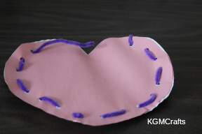 use the pipe cleaner to sew around the hearts heart step 5