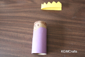 glue the robe to the tube and draw a face on the tube