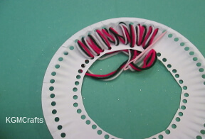 step 3 thread yarn through the holes