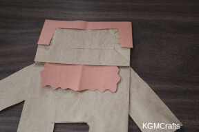 step 7 glue the beard under the flap