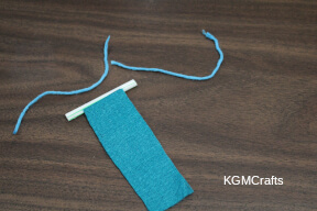 step 2 slide the felt through the slit in the straw