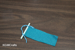 step 3 tie the yarn around the ends of the straw