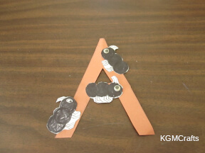 step 5 glue the ants to the letter
