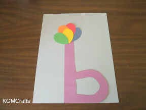 step 2 glue the balloons to the letter