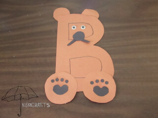 brown and black bear letter made into a bear