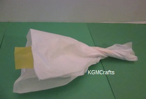 put the yellow tissue inside the white