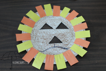 use a paper plate and construction paper to make a mask lion mask