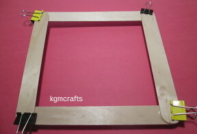 glue the Popsicle sticks together