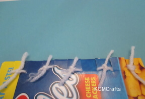 tie the yarn onto the loom