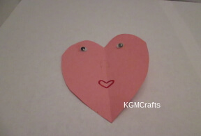 step 4 make a smaller heart and add a face