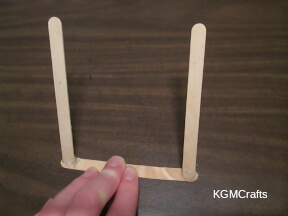purple cloth stand step 1 glue three sticks together
