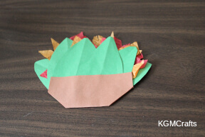 add the brown paper to the paper plant paper burning bush step 9