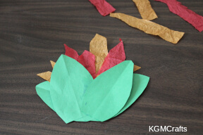 glue two leaves over the tissue paper burning bush step 5