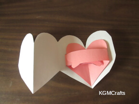 glue the pink heart inside the the card
