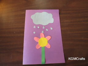 glue the cloud and raindrop to the card make a flower and glue