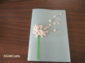 glue the tissue balls to the flower