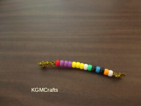 push the pipe cleaner back through the beads