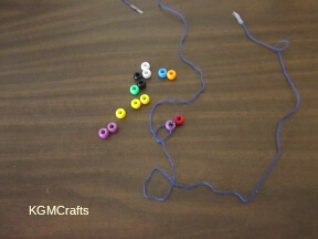 tie the string in front of the bead
