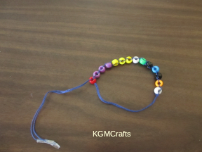 tie the string to the first bead