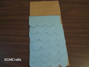 cut paper and glue to bag