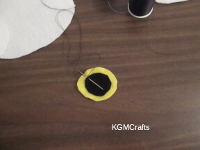 sew the black circle to the yellow