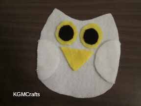 sew eyes and beak on front