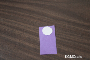 glue the circle to the top of the rectangle