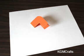 fold in half and cut out the center