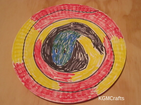 dragon step 1 color on plate in a spiral design