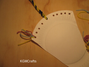step 5 add two more strings to the same hole