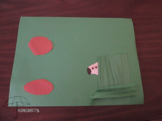 sheep behind green paper to represent grass parable of the lost sheep