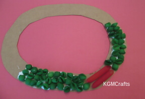 step 5 glue green pasta on circle