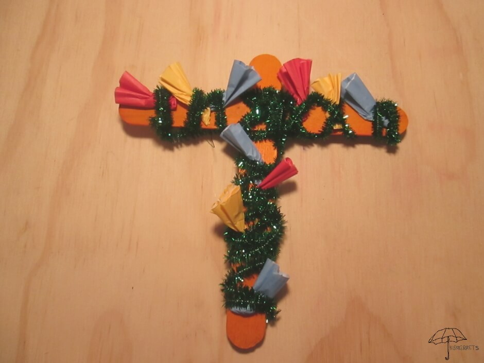 wooden cross with paper flowers Flower the cross Easter craft.