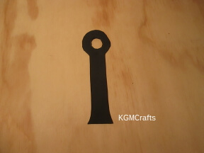 cut out the top from black craft foam