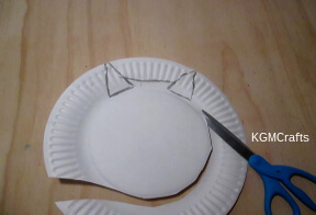 cat's face step 1 draw ear and cut off rim
