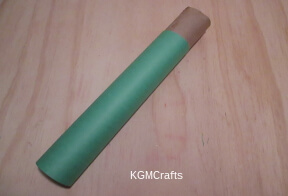 step 3 cover roll with green paper