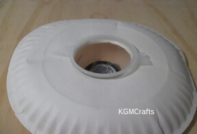 tape the cup to the plate