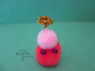 pink, orange, and purple angel pompom angel